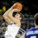 Michigan senior Zack Novak takes a shot early in the first quarter against Northwestern at Crisler Center on Wedensday. Melanie Maxwell I AnnArbor.com
